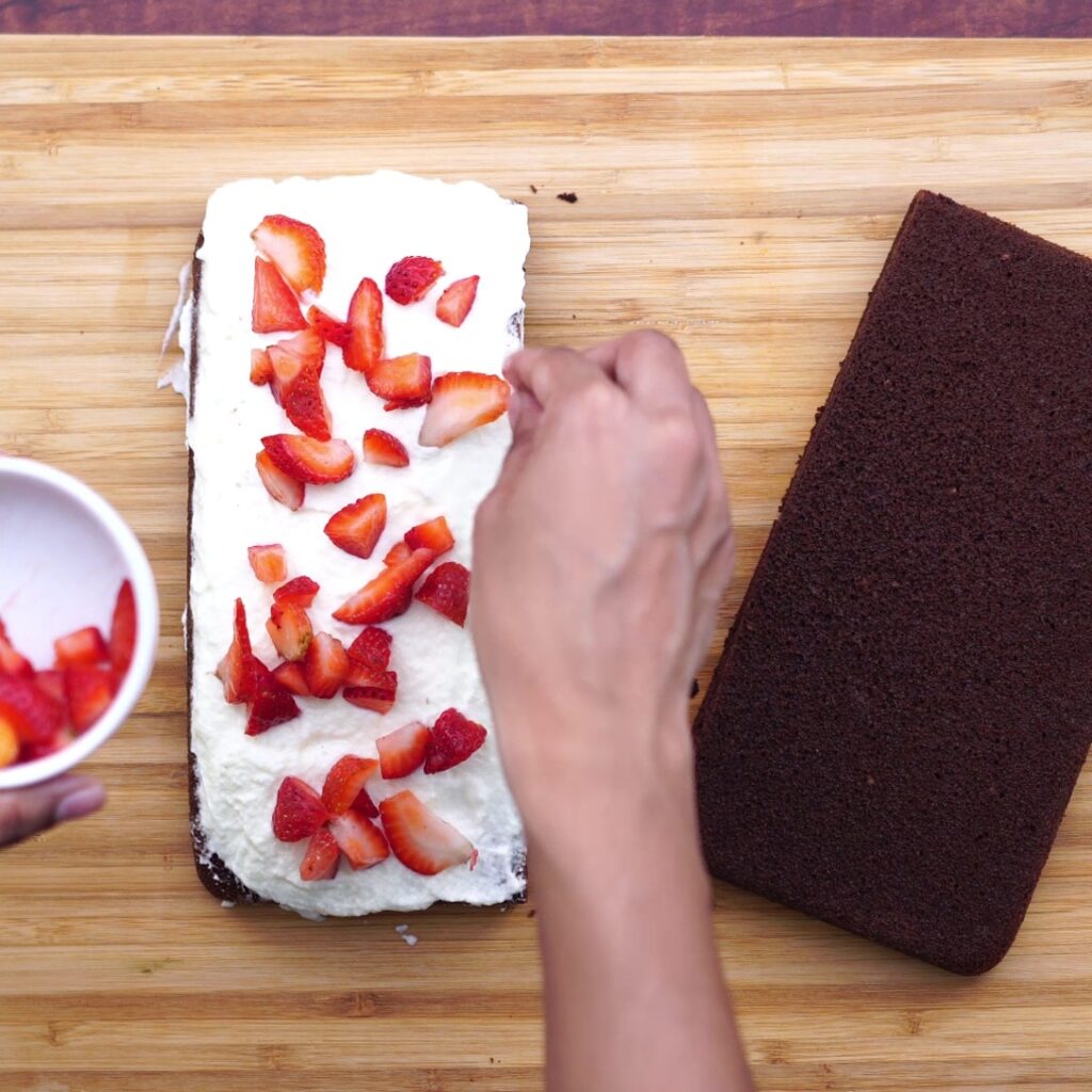 topping cake with strawberry