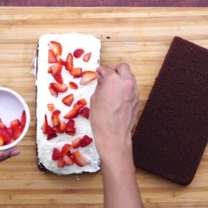 topping cake with strawberry