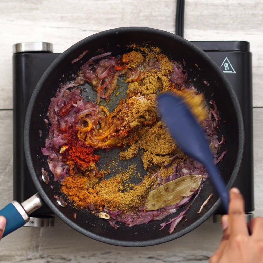 adding masala and mixing