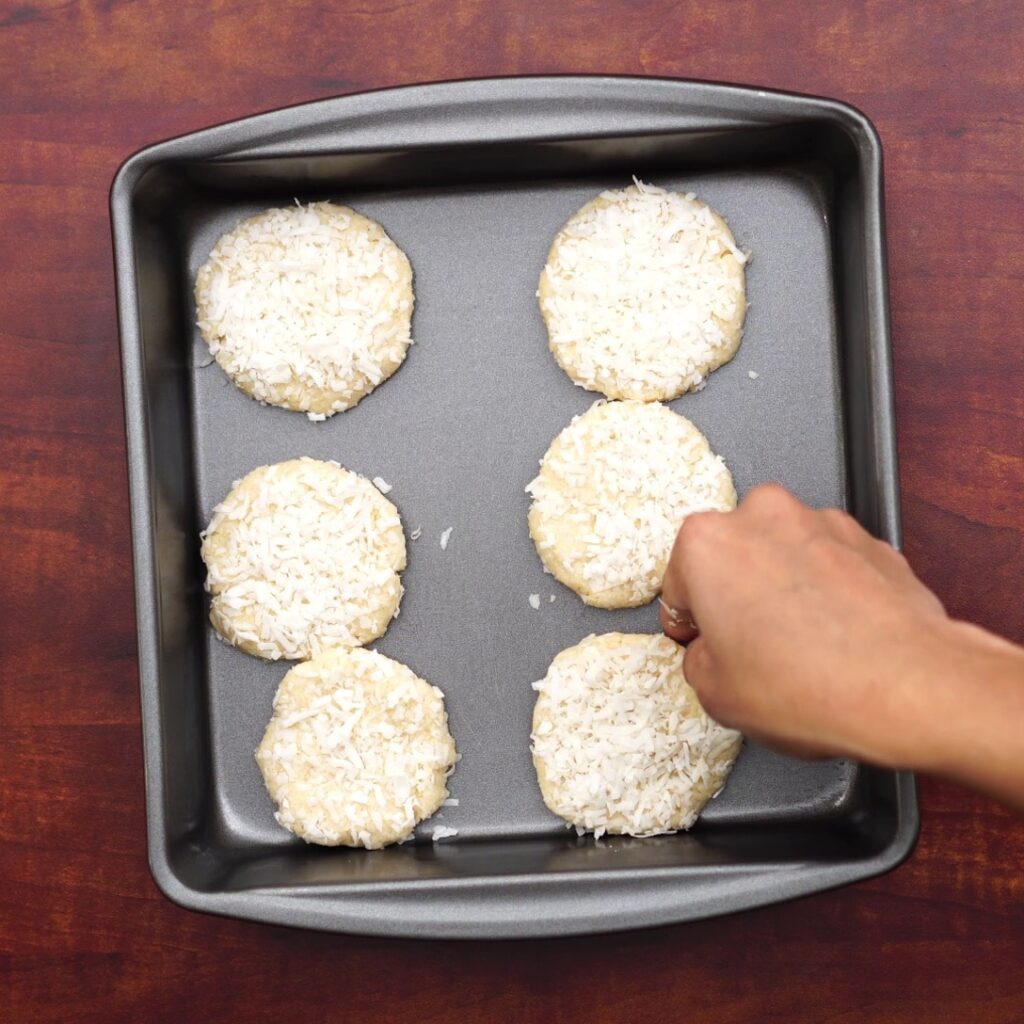 placing dough in a tray