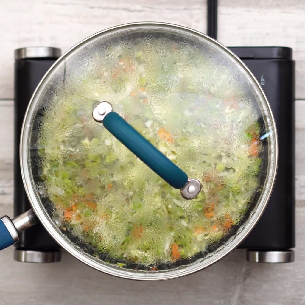 closing the pan and cooking