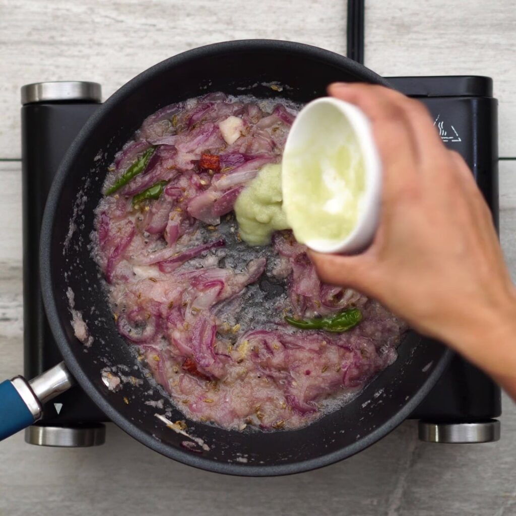 adding ginger garlic paste and mixing