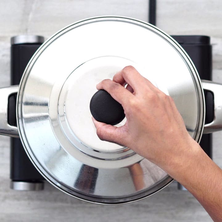Closing the pan and cooking