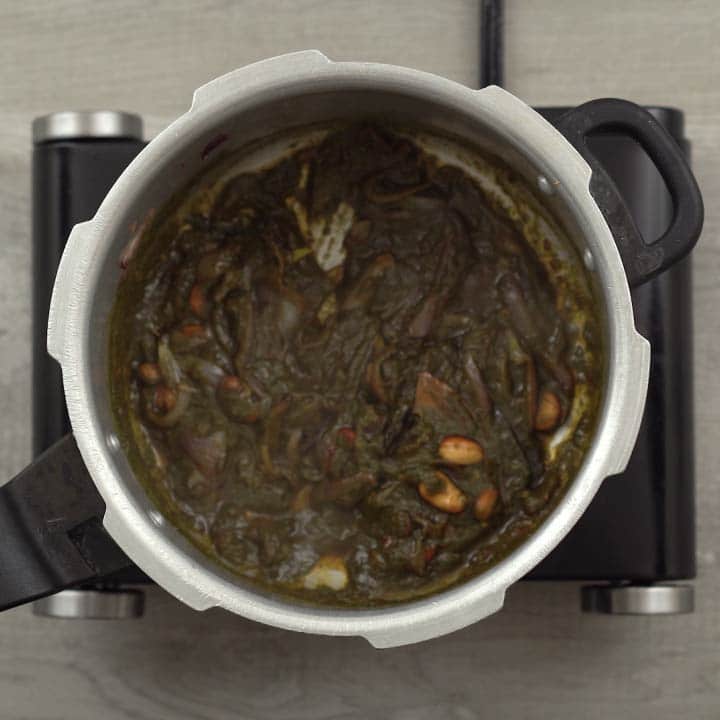 Sautéing Indian spices and mint paste
