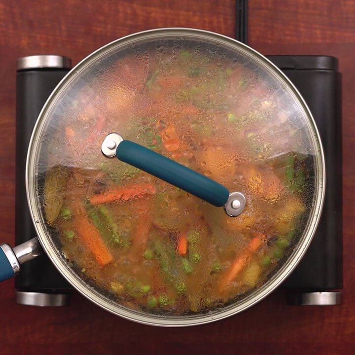 Vegetables are cooking with lid closed