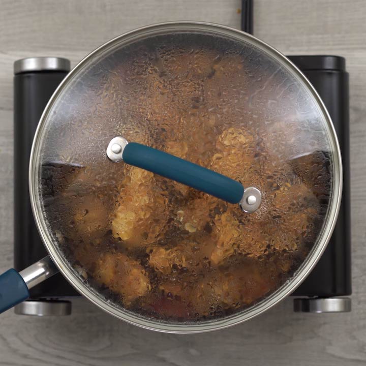 chicken is cooking again with its lid closed