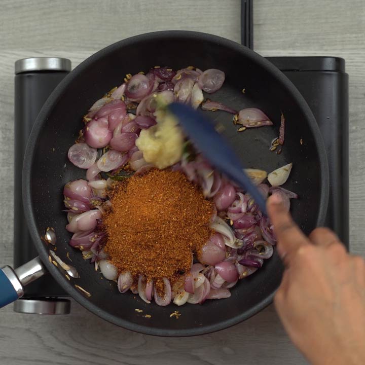 Adding ginger garlic paste and chettinad spice powder