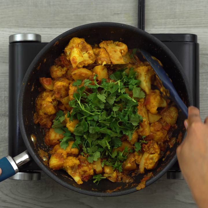 garnishing with coriander leaves