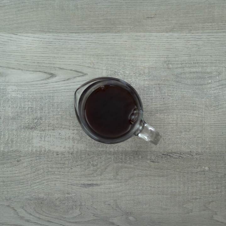 Black coffee in a water jug.