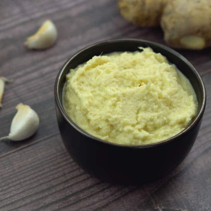 ginger garlic paste in a black bowl