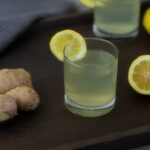 Ginger Root Lemon Tea with Honey placed on a tray.