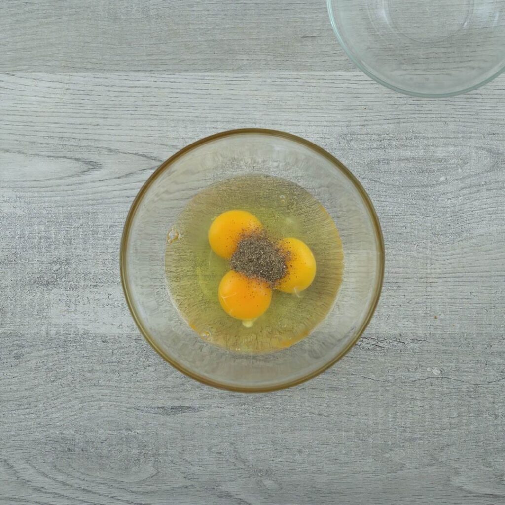 eggs, salt and pepper in a bowl