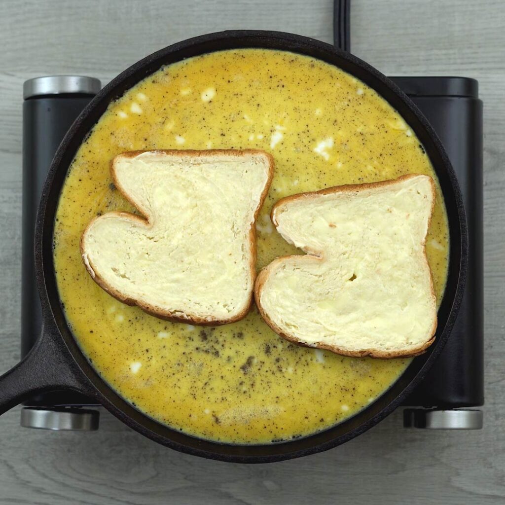 bread placed on the omelet
