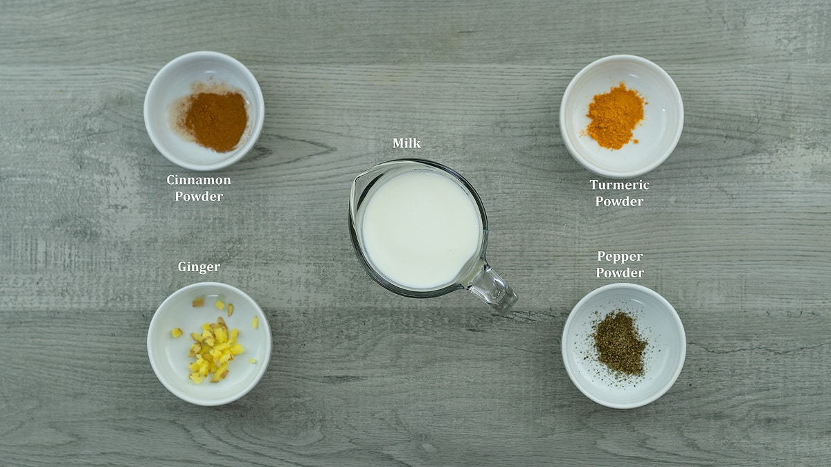 Golden Milk ingredients placed on a table.