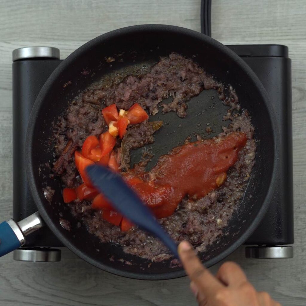 sauteing tomatoes and paste