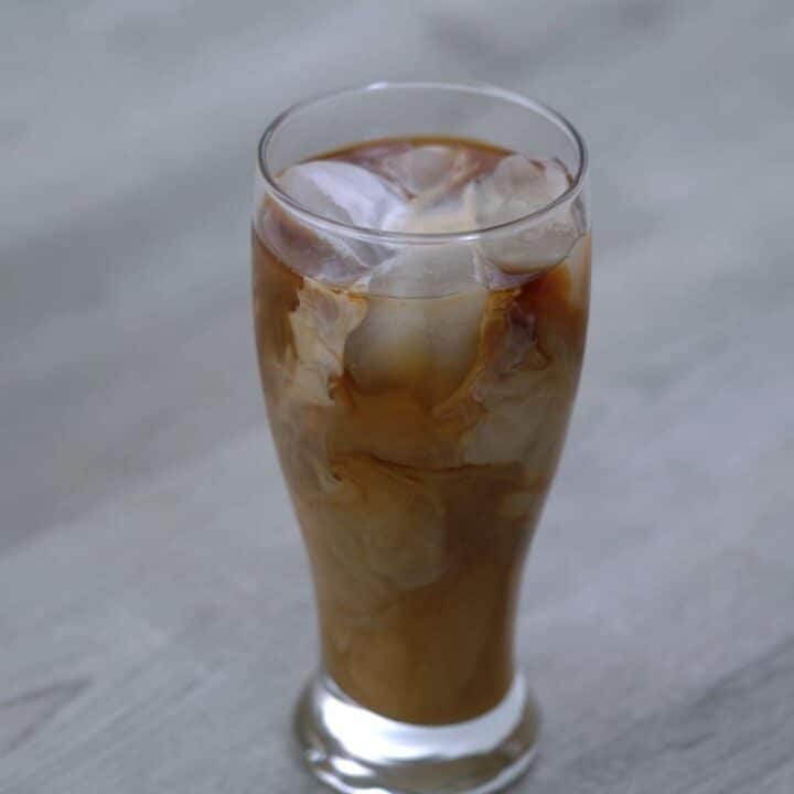 Iced coffee served in a glass.
