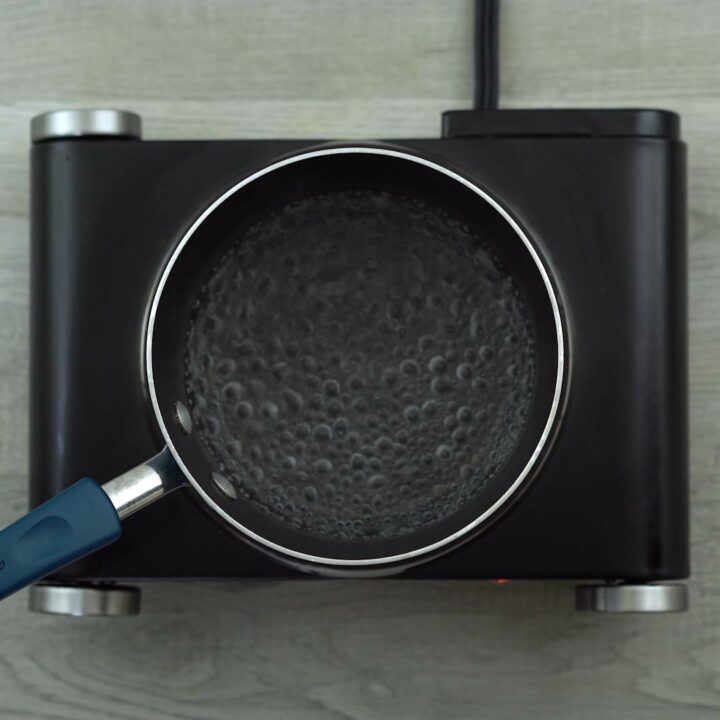 Water boiling in a saucepan.