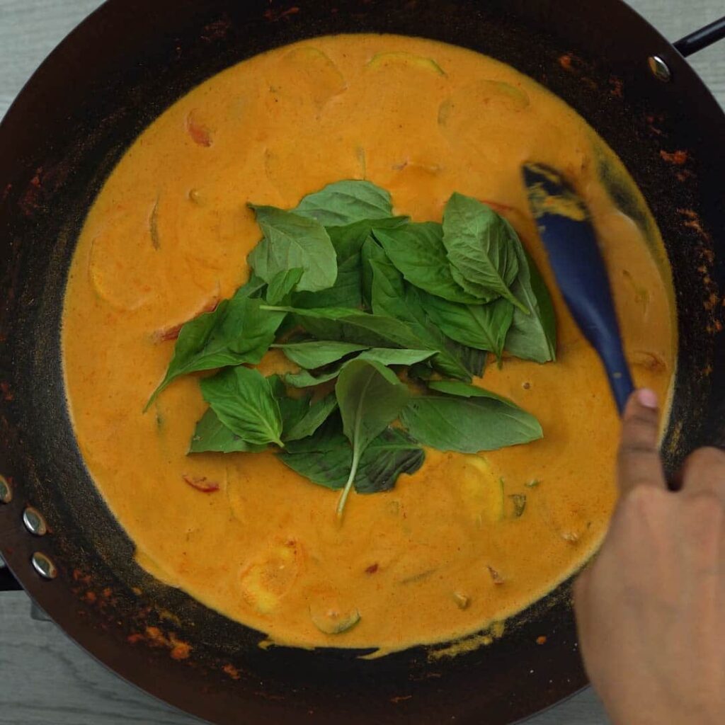 basil leaves added to the curry