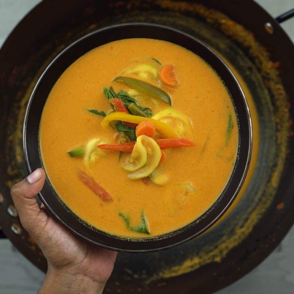 Thai red curry with vegetables in a bowl