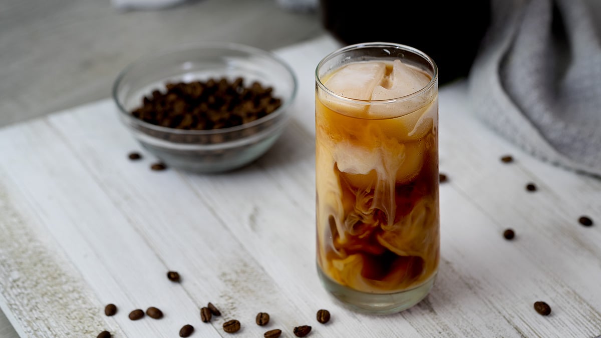 Cold brew coffee in a serving glass with swirls.