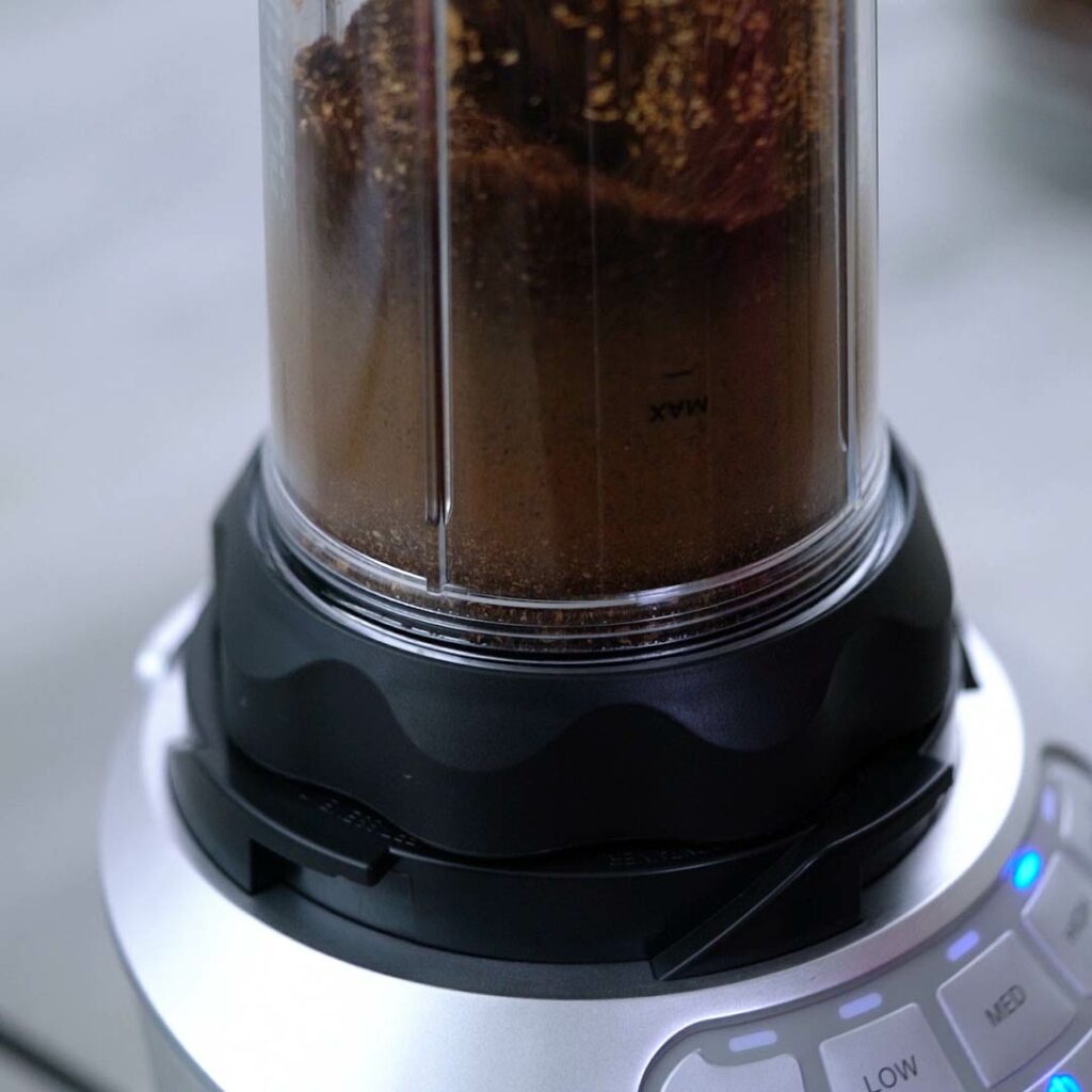 Ground Coffee Powder in blender jar.