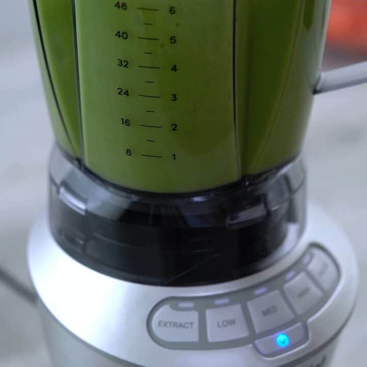 Grinding all the ingredients in a blender.