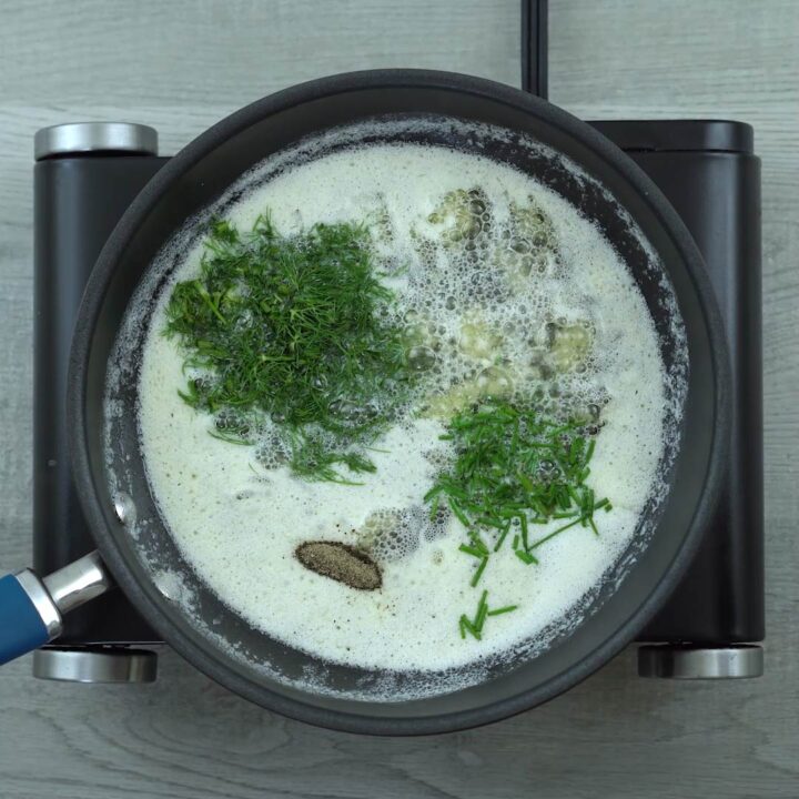herbs are added to the garlic butter