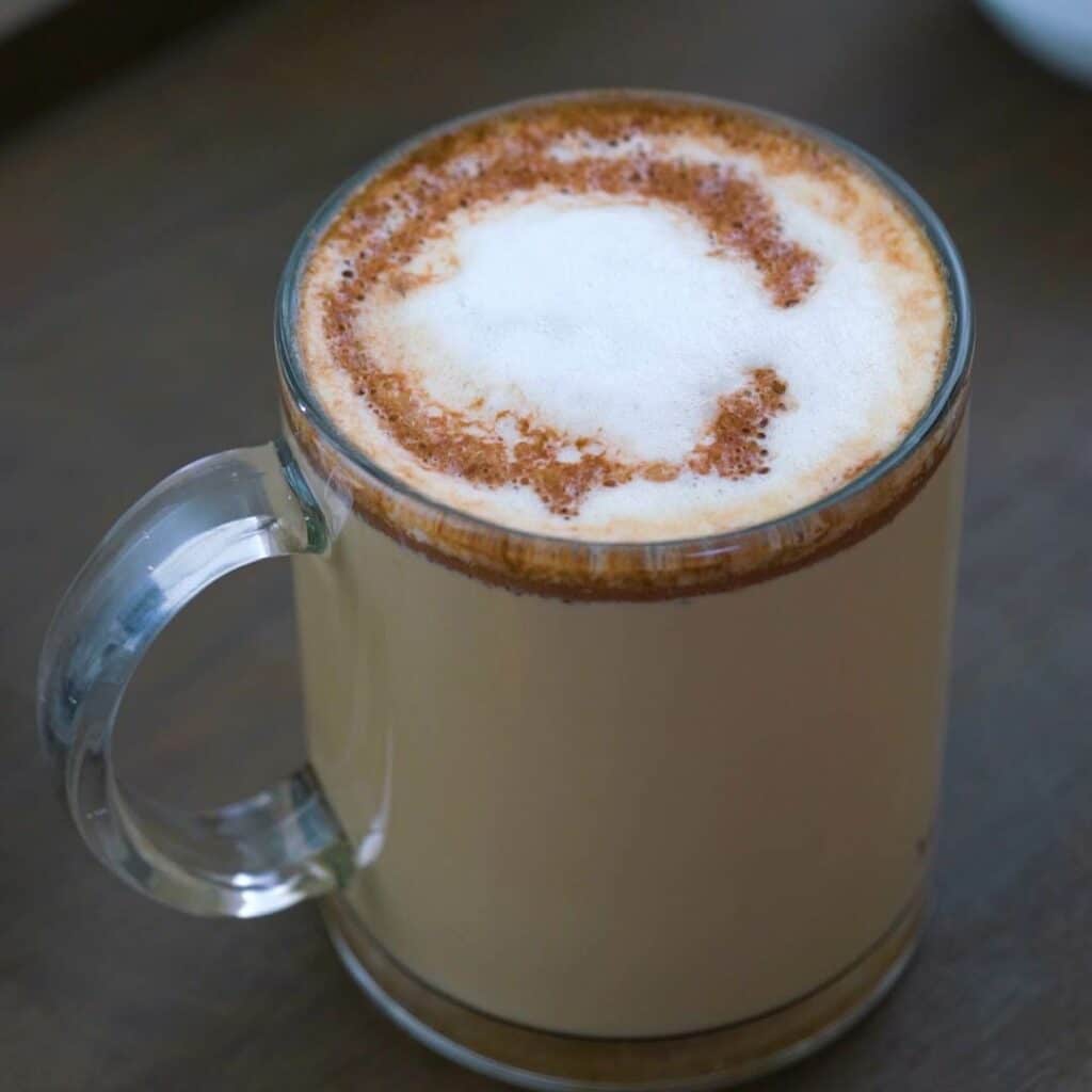 Mocha Coffee served in a glass mug.