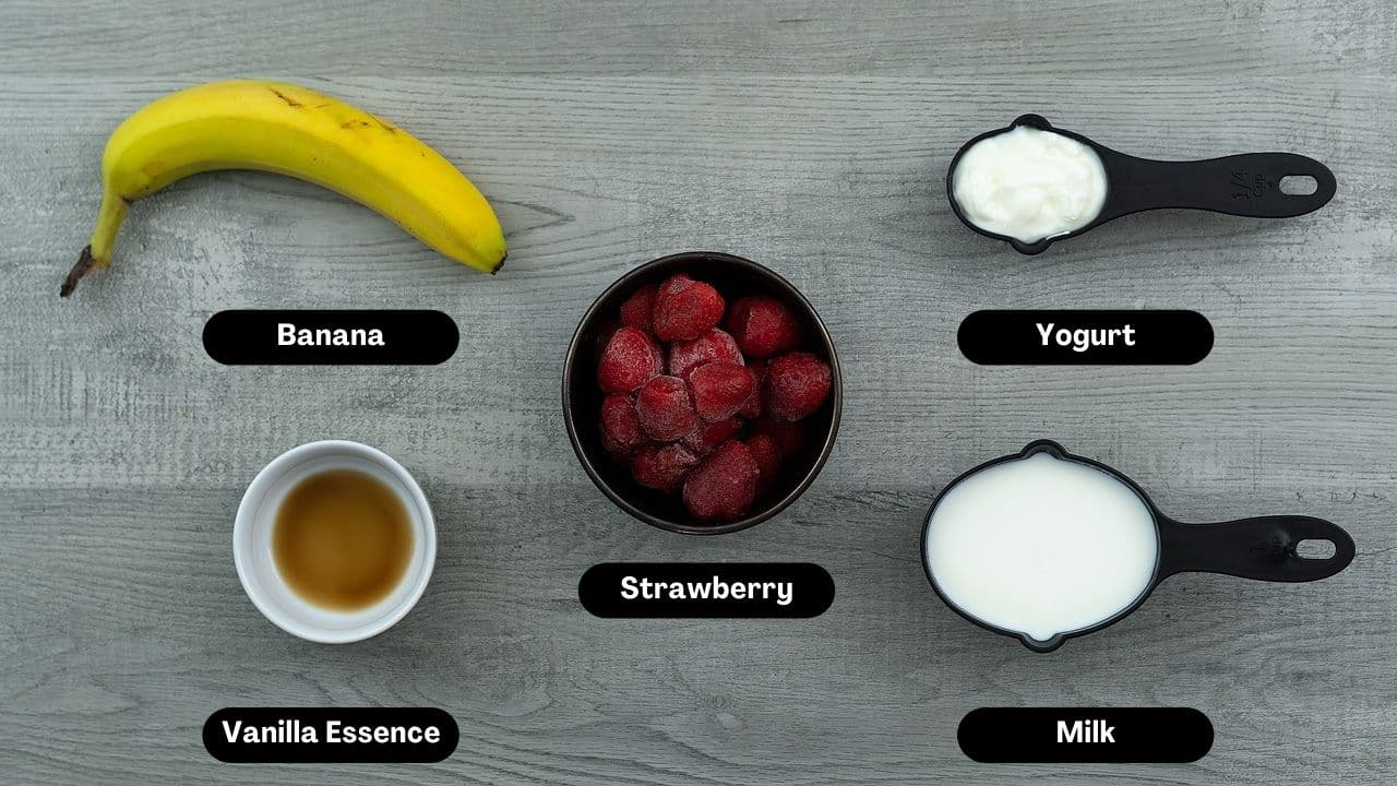 Strawberry Banana Smoothie Ingredients placed on a table.