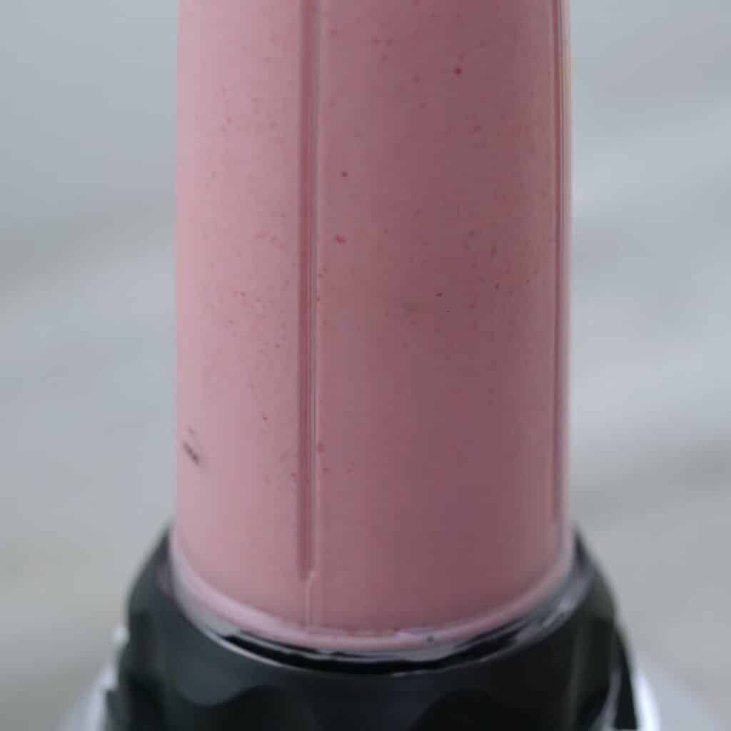 The ingredients are blending to smooth in a blender.