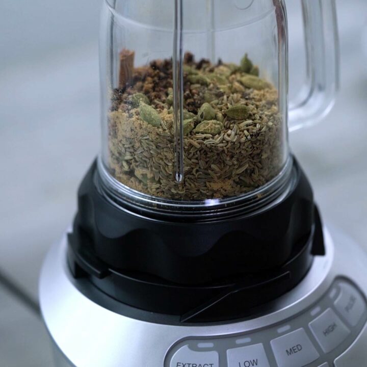 Chai masala spices in the blender jar.