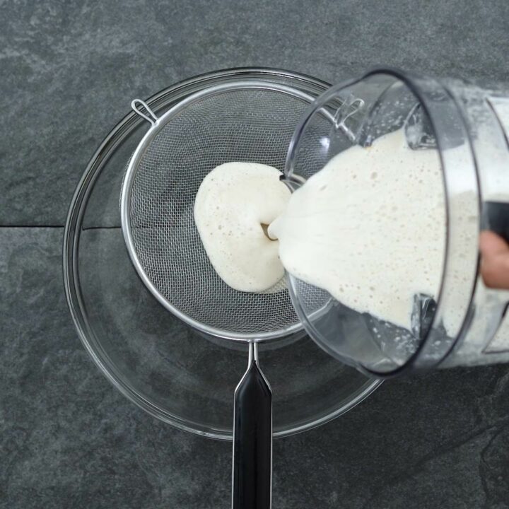Filtering the oat milk.