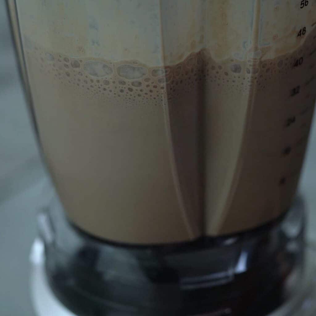 Blending the hot chocolate in blender.