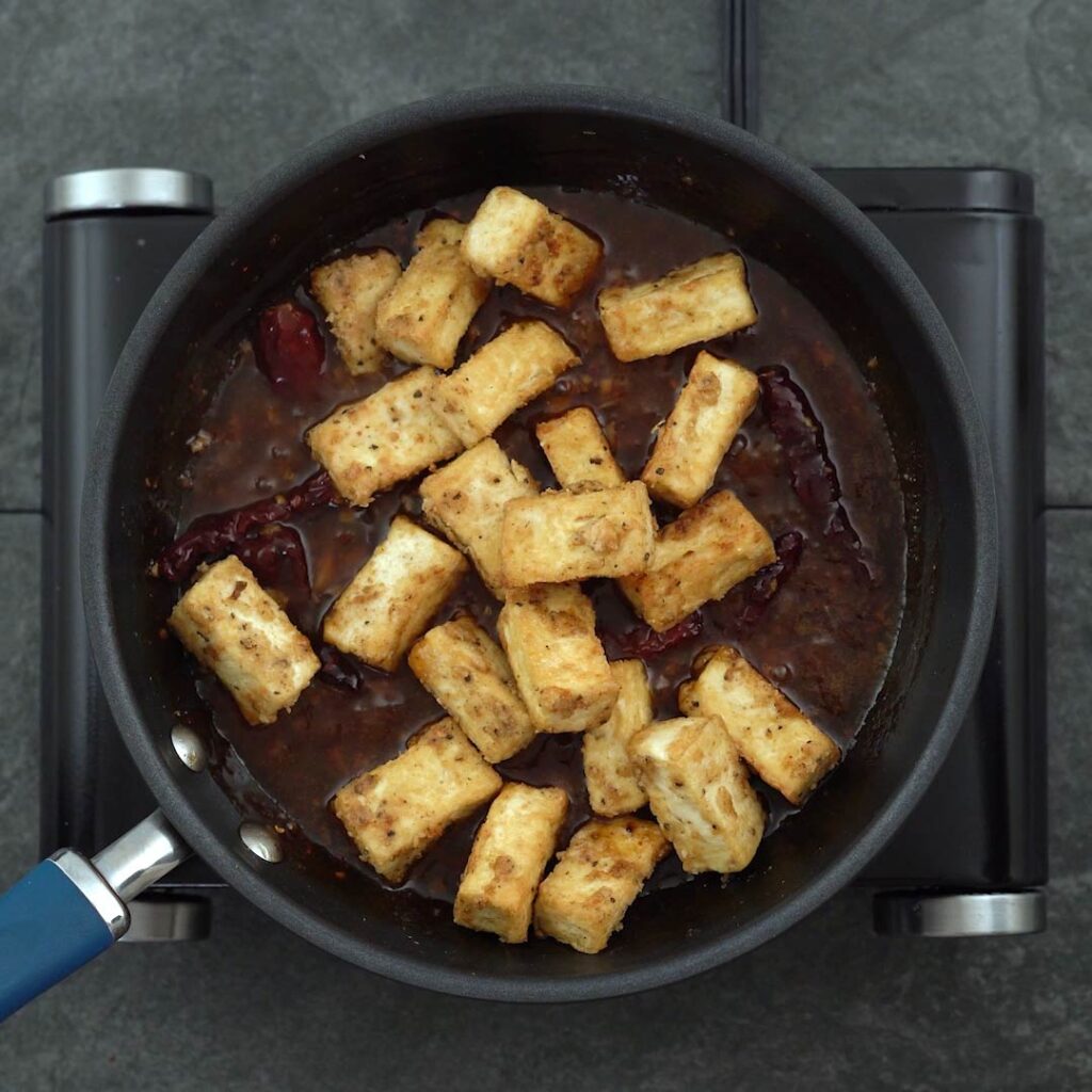 fried tofu is added to sauce
