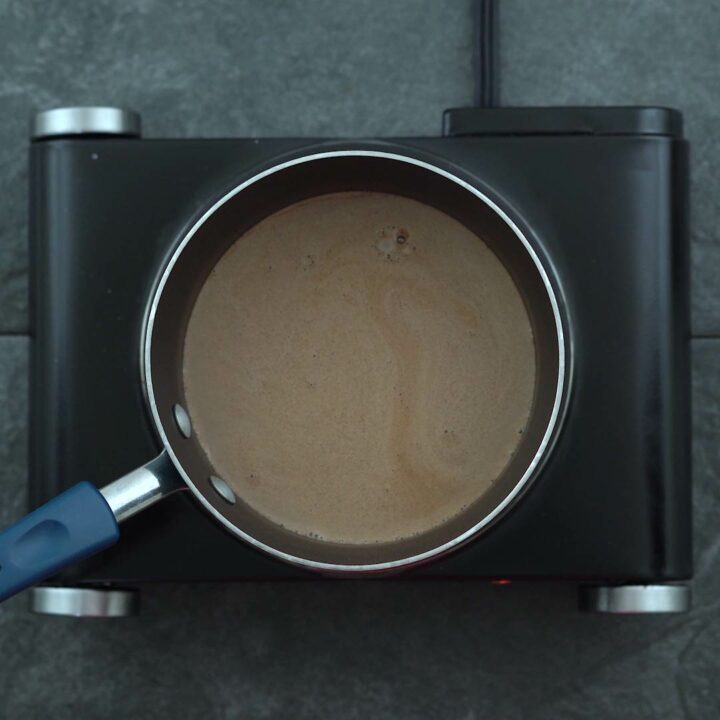 Hot Cocoa warming up in the saucepan.