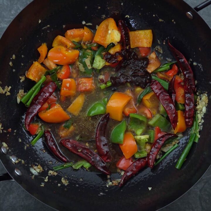 seasoning sauces are added to veggies