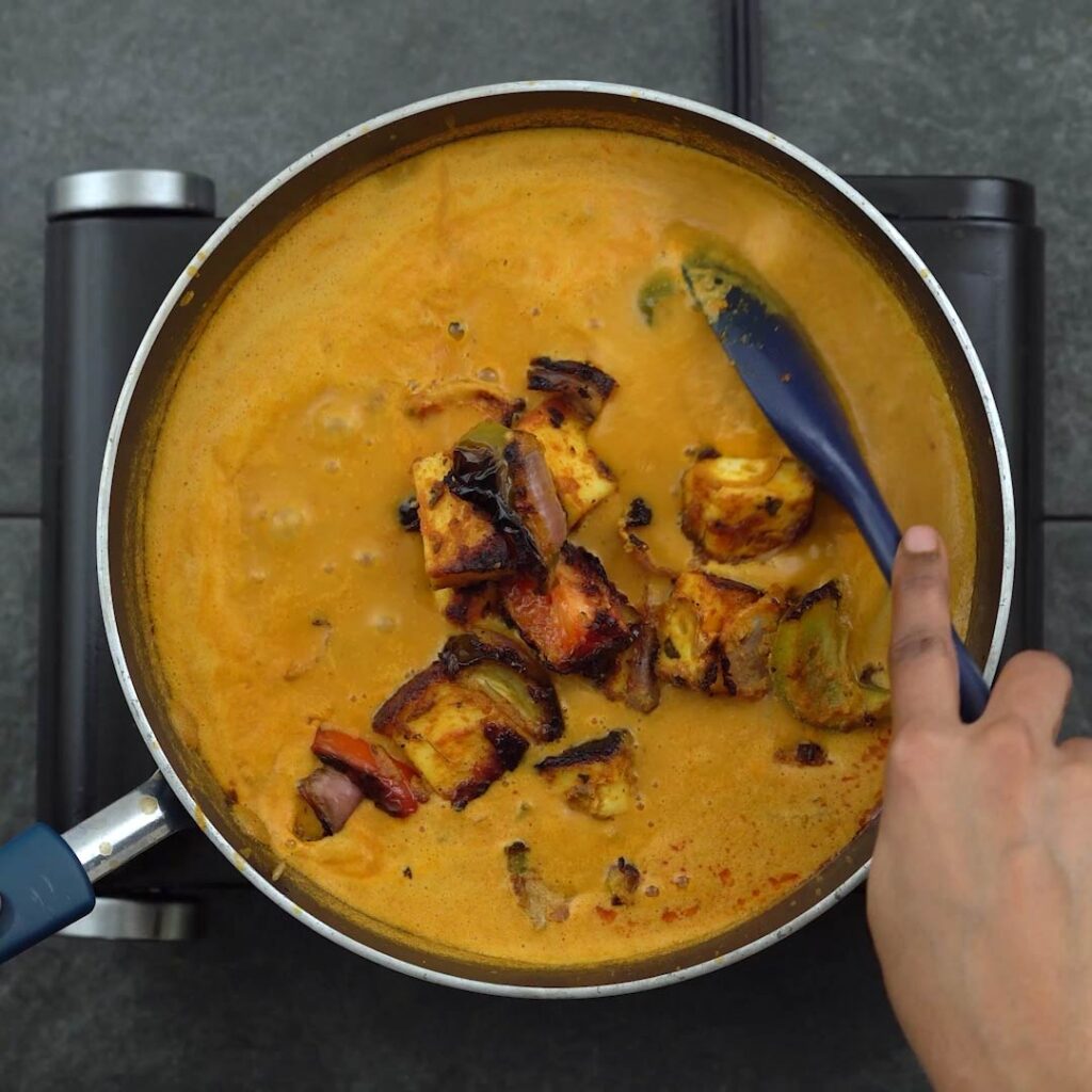Grilled paneer and veggies are added to masala gravy