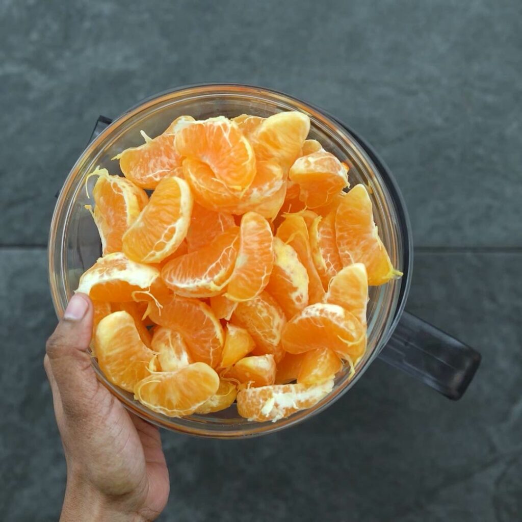 Peeled Oranges in a bowl.