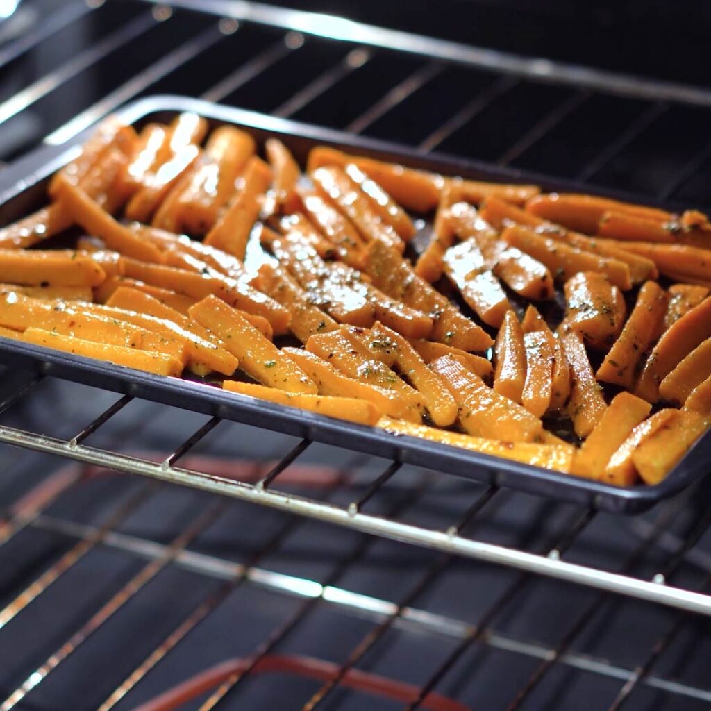 carrots placed in the preheated oven