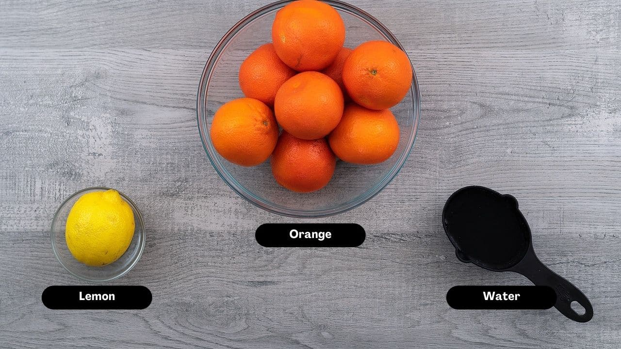 Orange juice ingredients on a table.