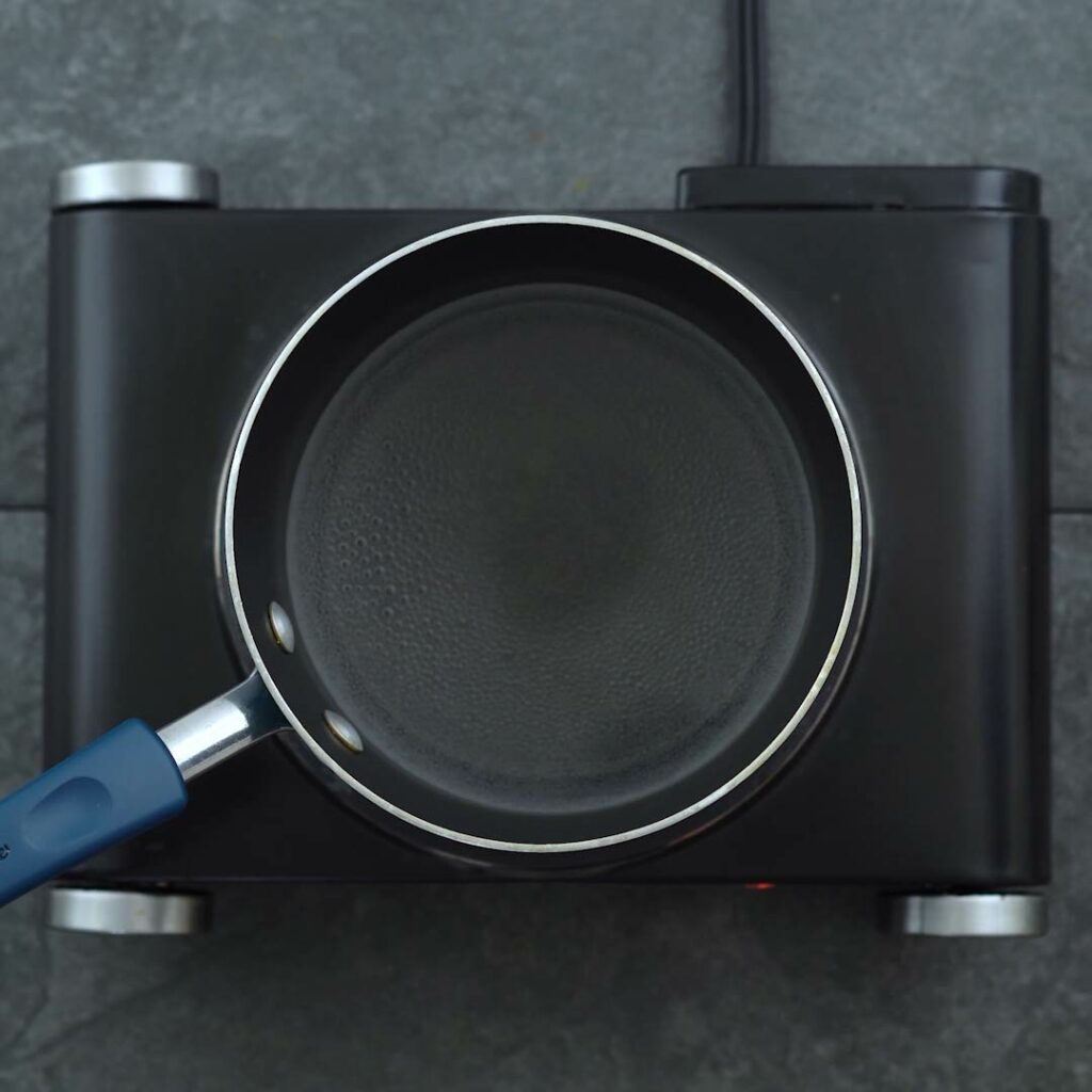 Water boiling in a saucepan.