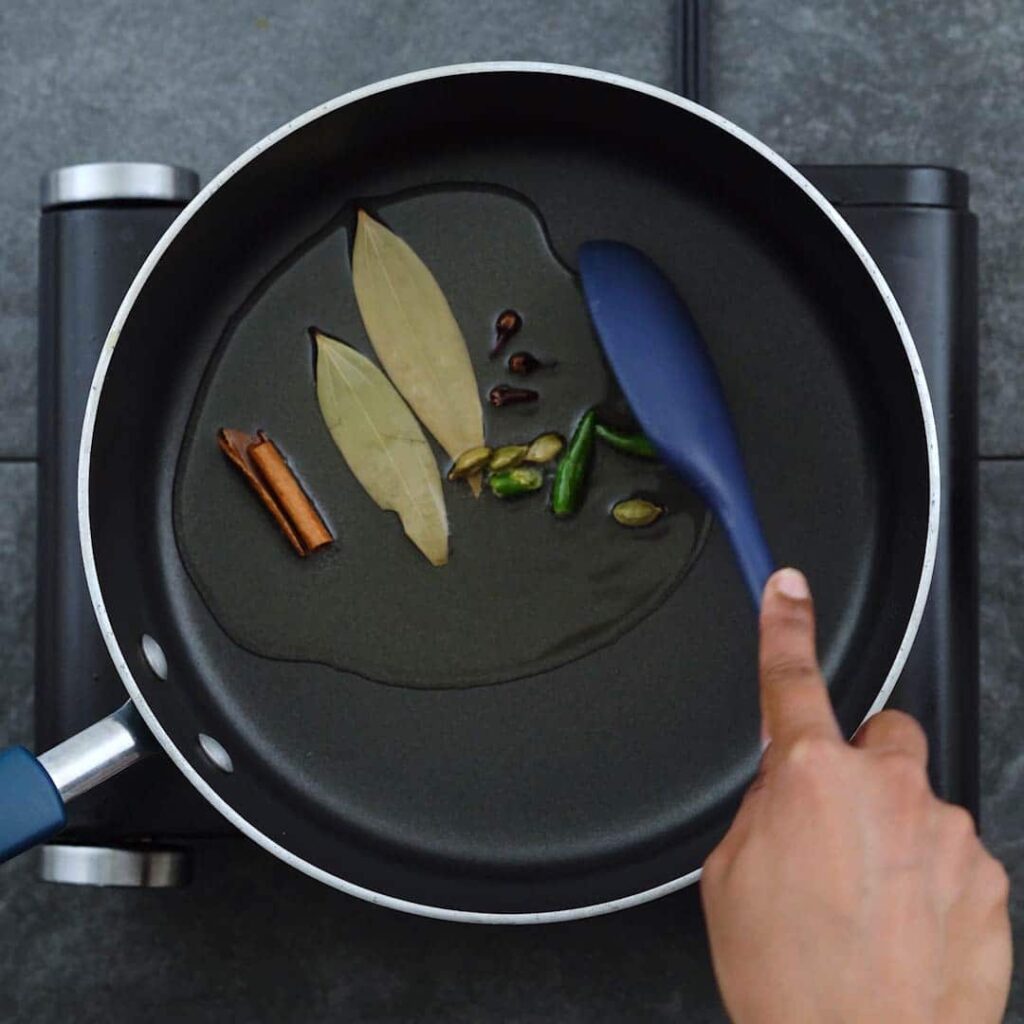 Sauteing the whole Indian spices