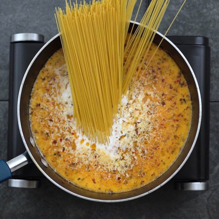 Pasta added to pasta sauce mixture