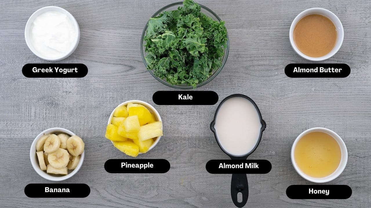 Kale Pineapple Smoothie Ingredients on a table.