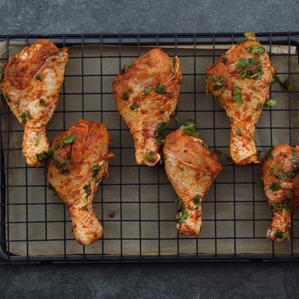 Seasoned Chicken Drumstick in a baking tray