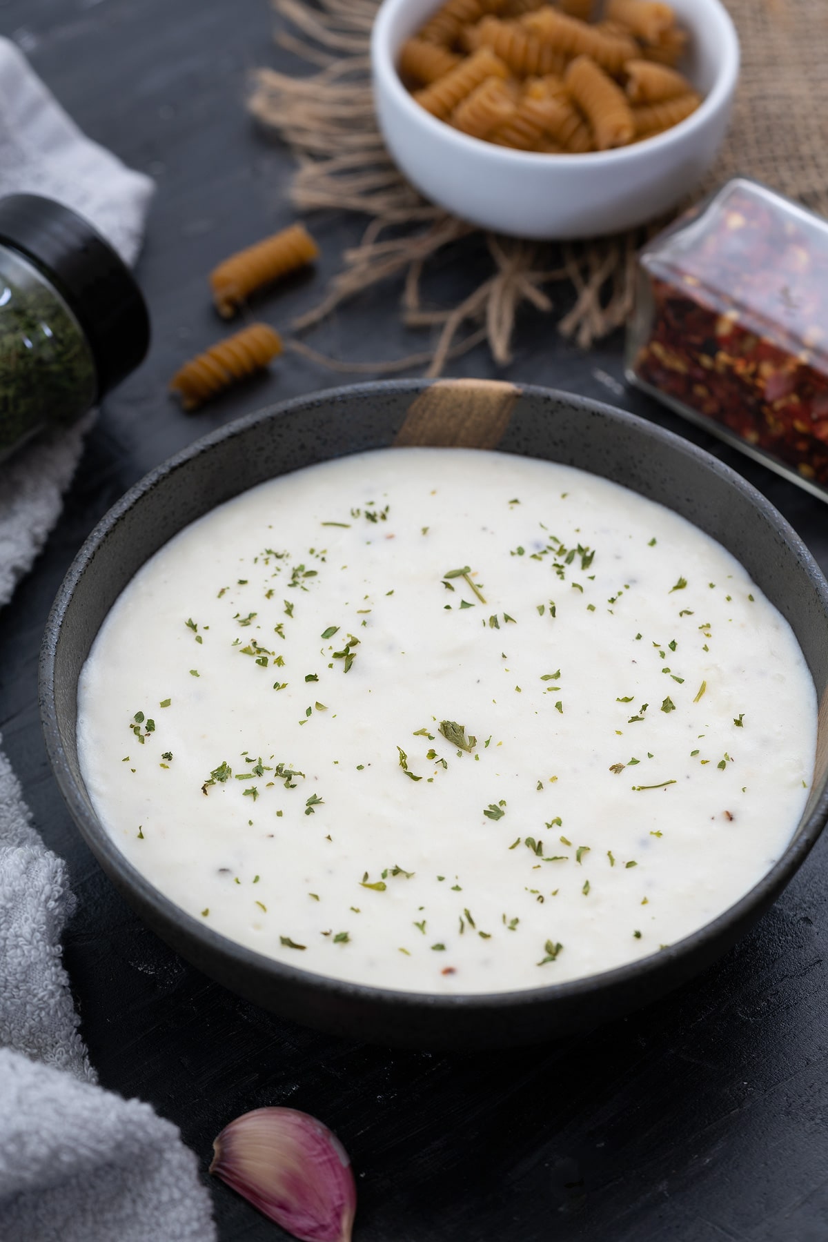 Creamy Bechamel or White Sauce in a bowl on a table 