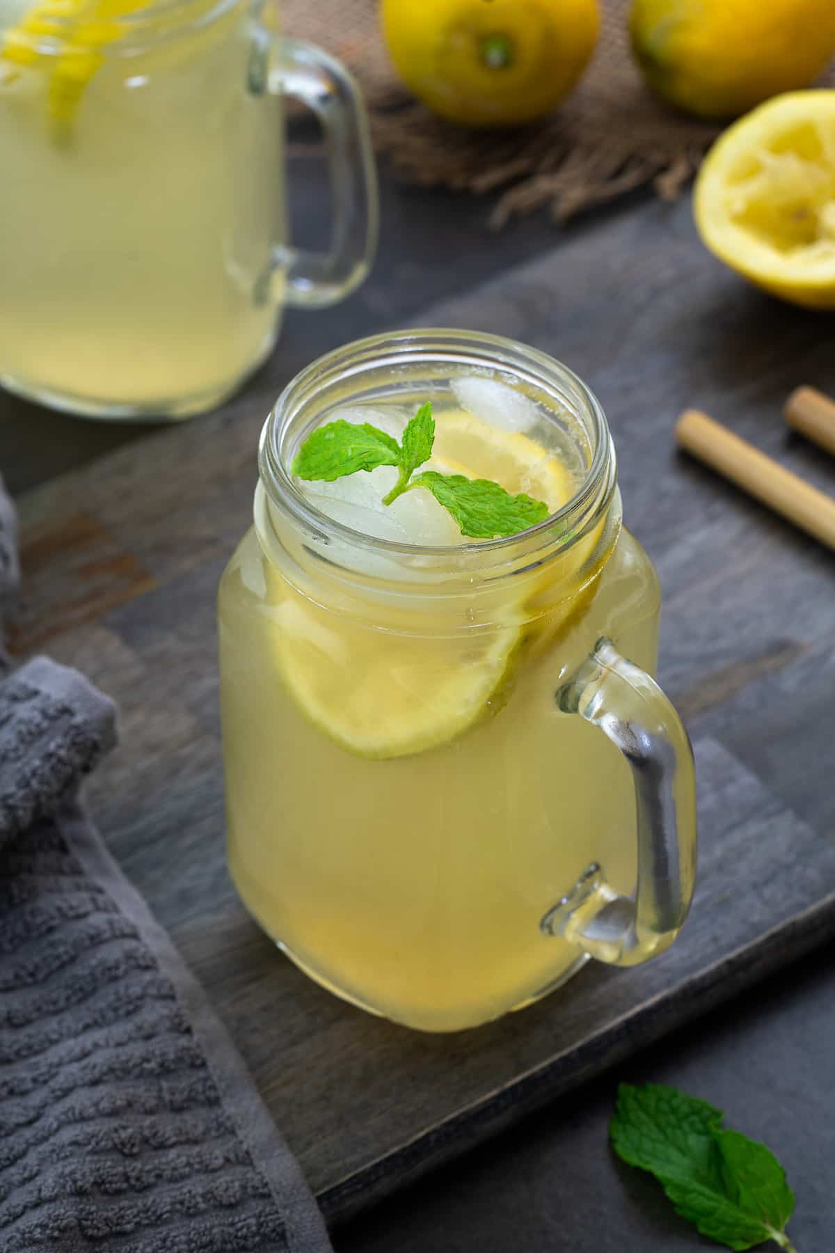 Homemade Lemonade in a serving glass mug.