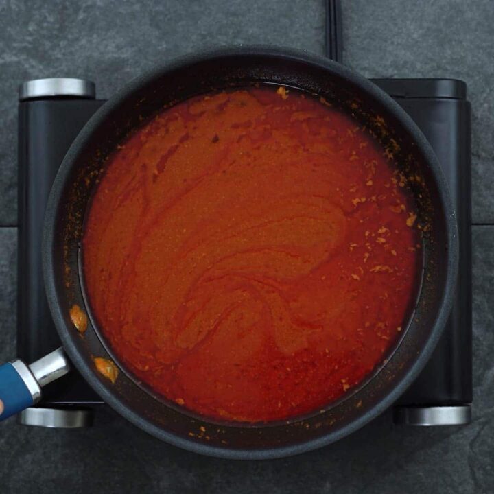 Buffalo Sauce simmering in a pan