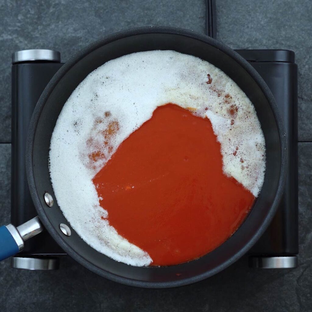Butter with hot sauce in a pan