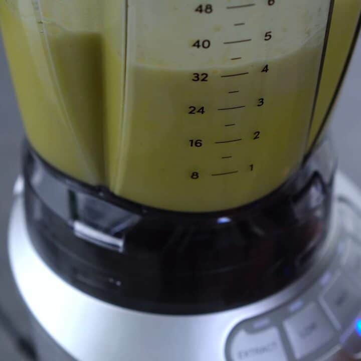 Pineapple juice blending in a jar.